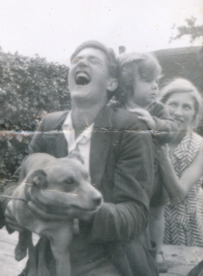 Elliott Family  Man woman dog child.