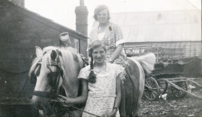 Elliott family Two girls and horse