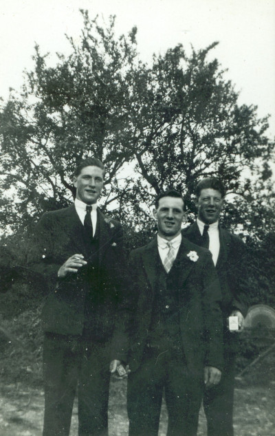 Elliott Family 3 men in suits