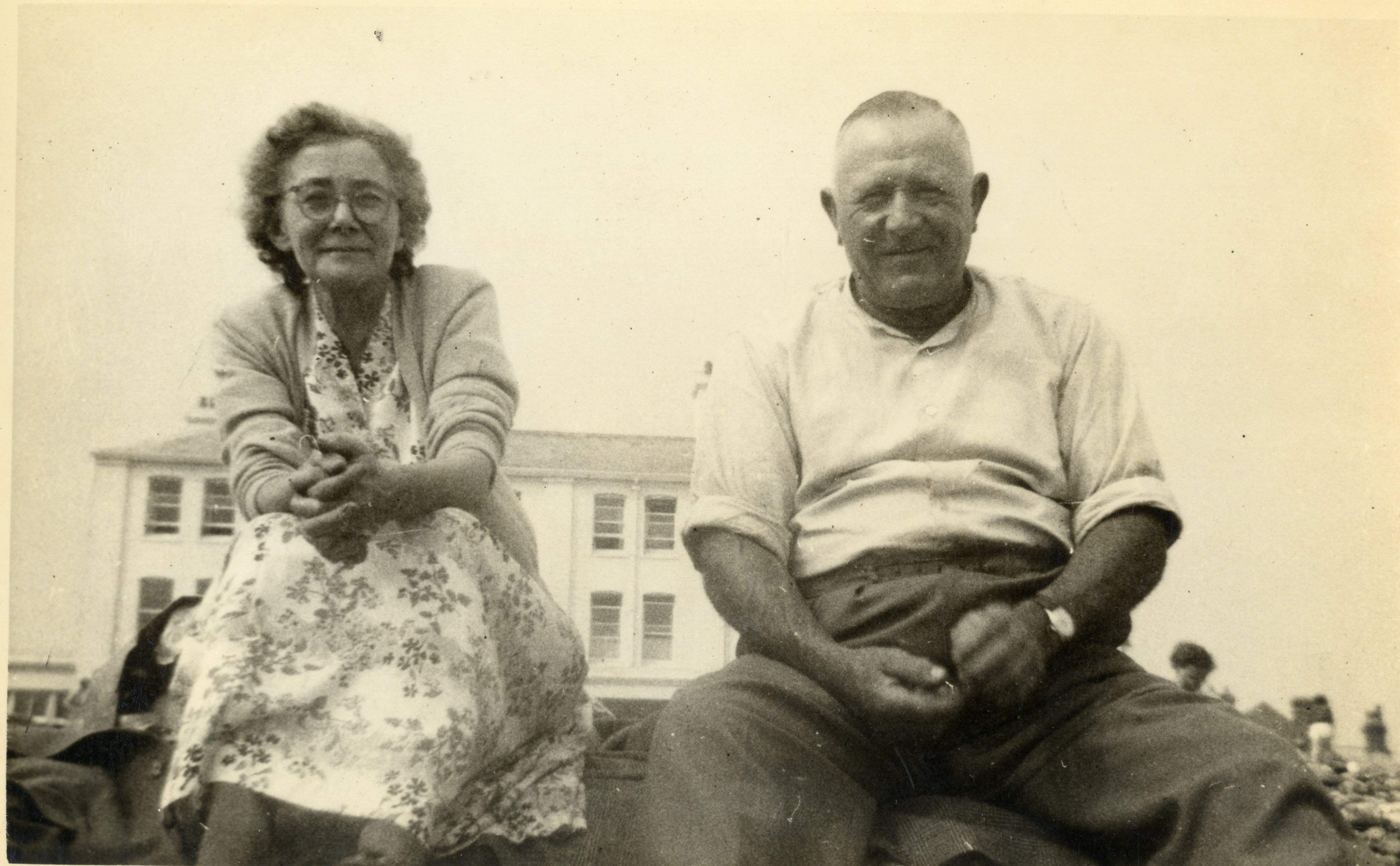 Elderly couple at seaside.