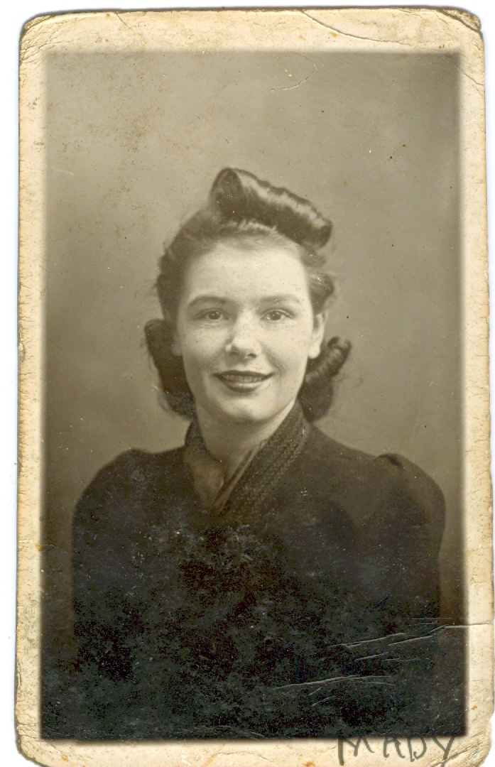 1941 woman with curled hair.