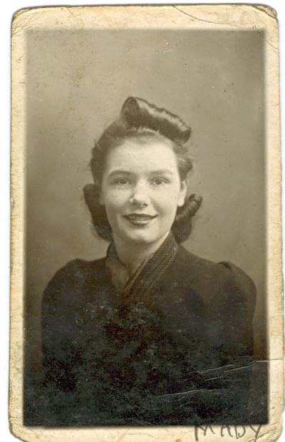 1941 woman with curled hair.