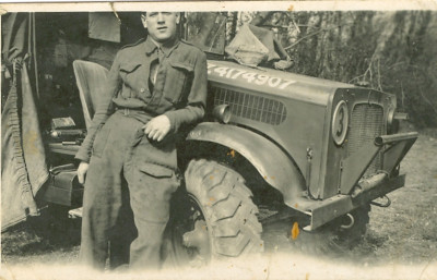 WW2 soldier and army vehicle.