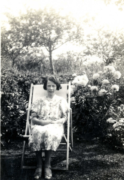 Edie Male, sitting in deckchair