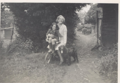 Millicent Reed, with Gillian as a child & dog.