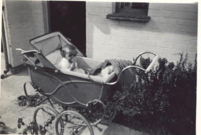 Unknown baby in pram.