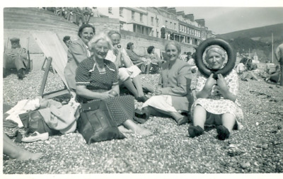 Beatrice Reed with friends on Sidmouth Beach