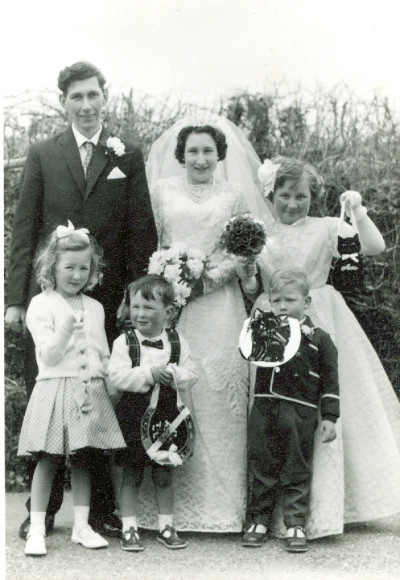 Wedding of possibly Philip Reed with bridesmaids and page boys.