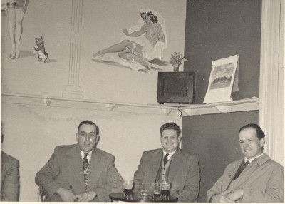 Three men in pub.