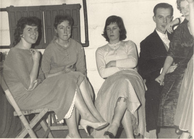 Group of women and man at glovers social event.