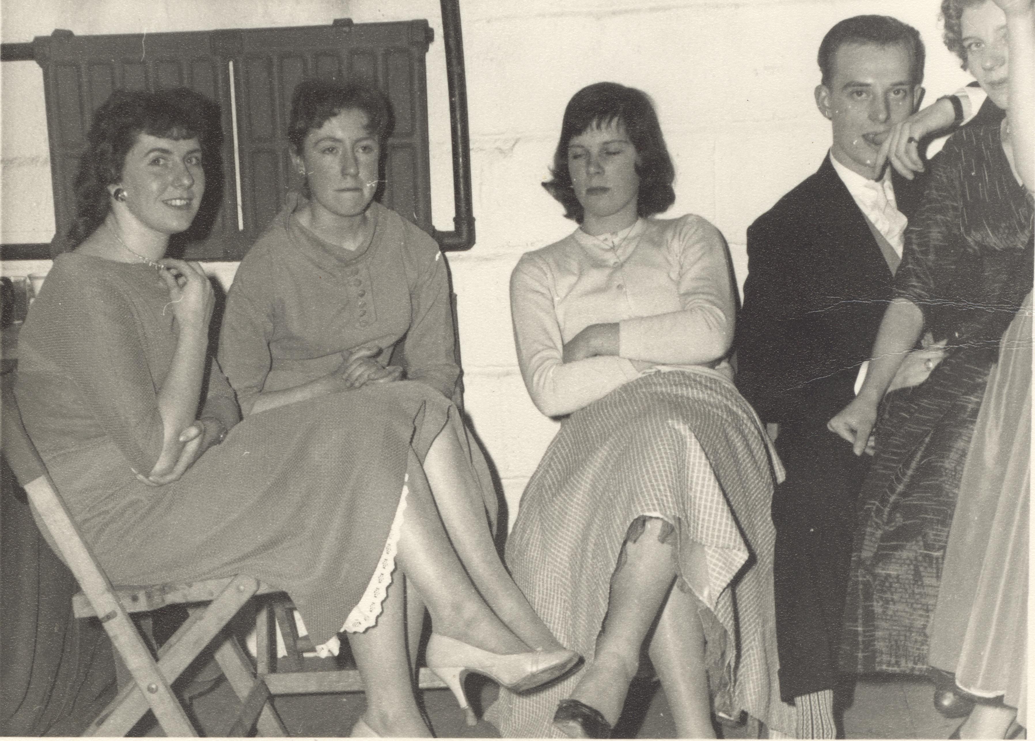 Group of women and man at glovers social event.