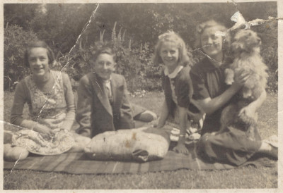 Millicent Reed with children and dog.