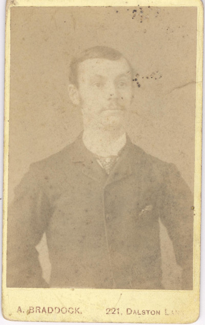 Man in Victorian clothes.
