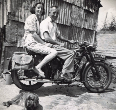 Unknown couple on motorbike