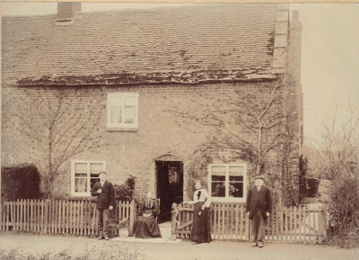 Brick cottage, with stone tiles on edge of roof