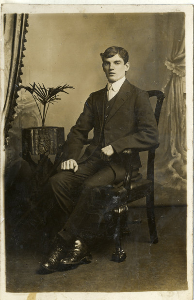 Well dressed young man in studio portrait