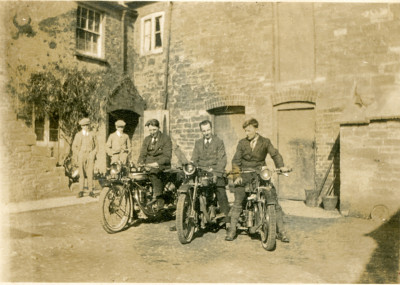 Men on motorbikes at rear of Wyndham Arms.