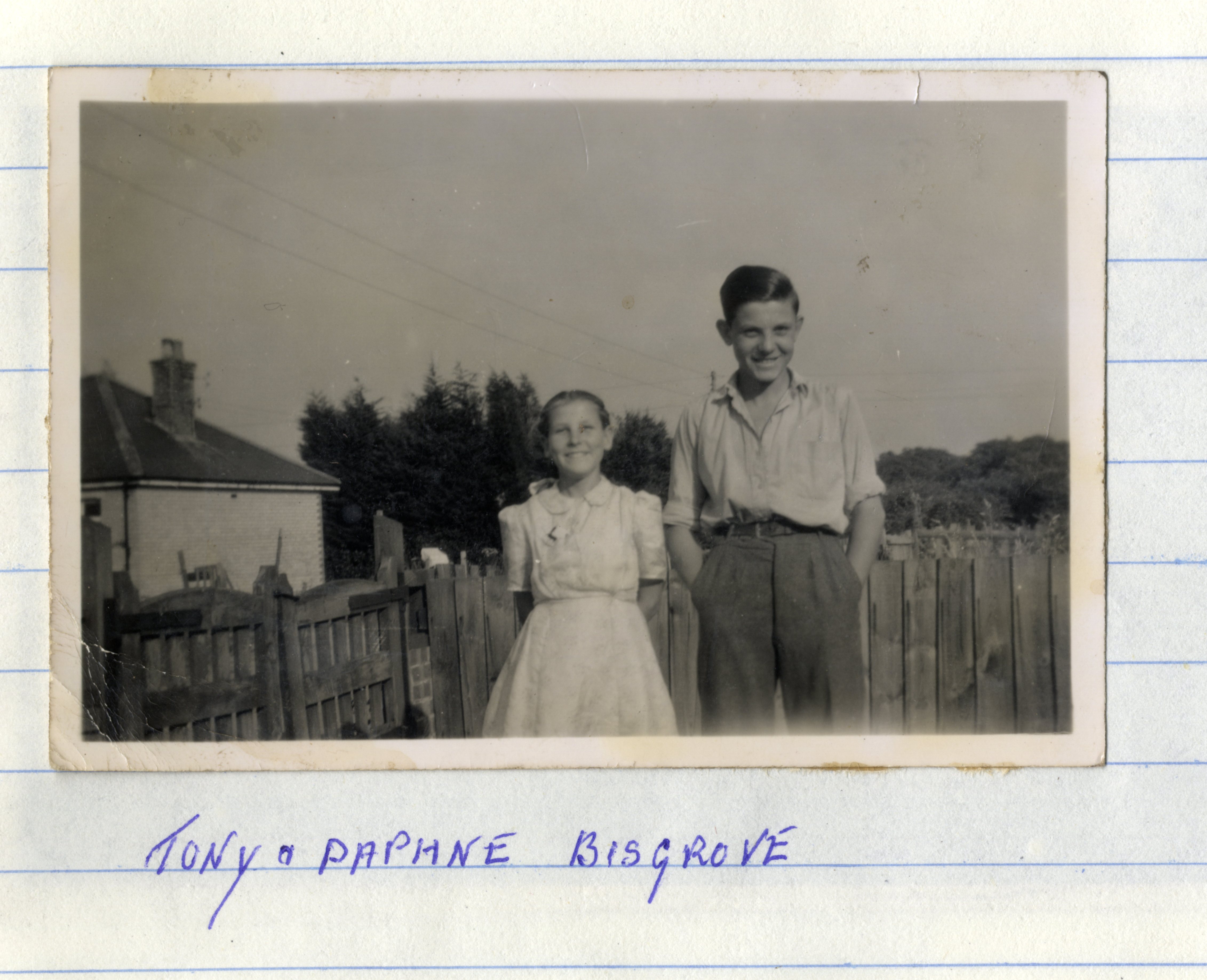 Two children by gate