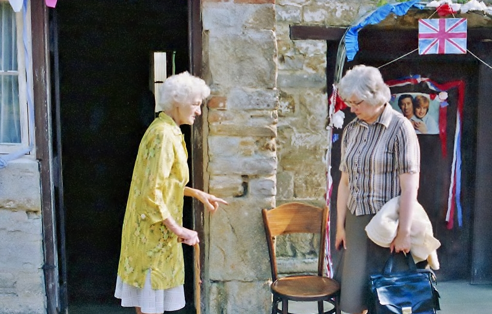 Two women outside Church Cottage
