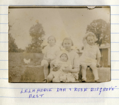 Young woman and three children