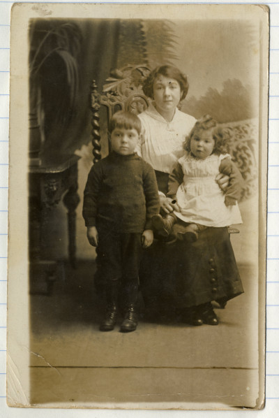 Mother with two children,  studio photo
