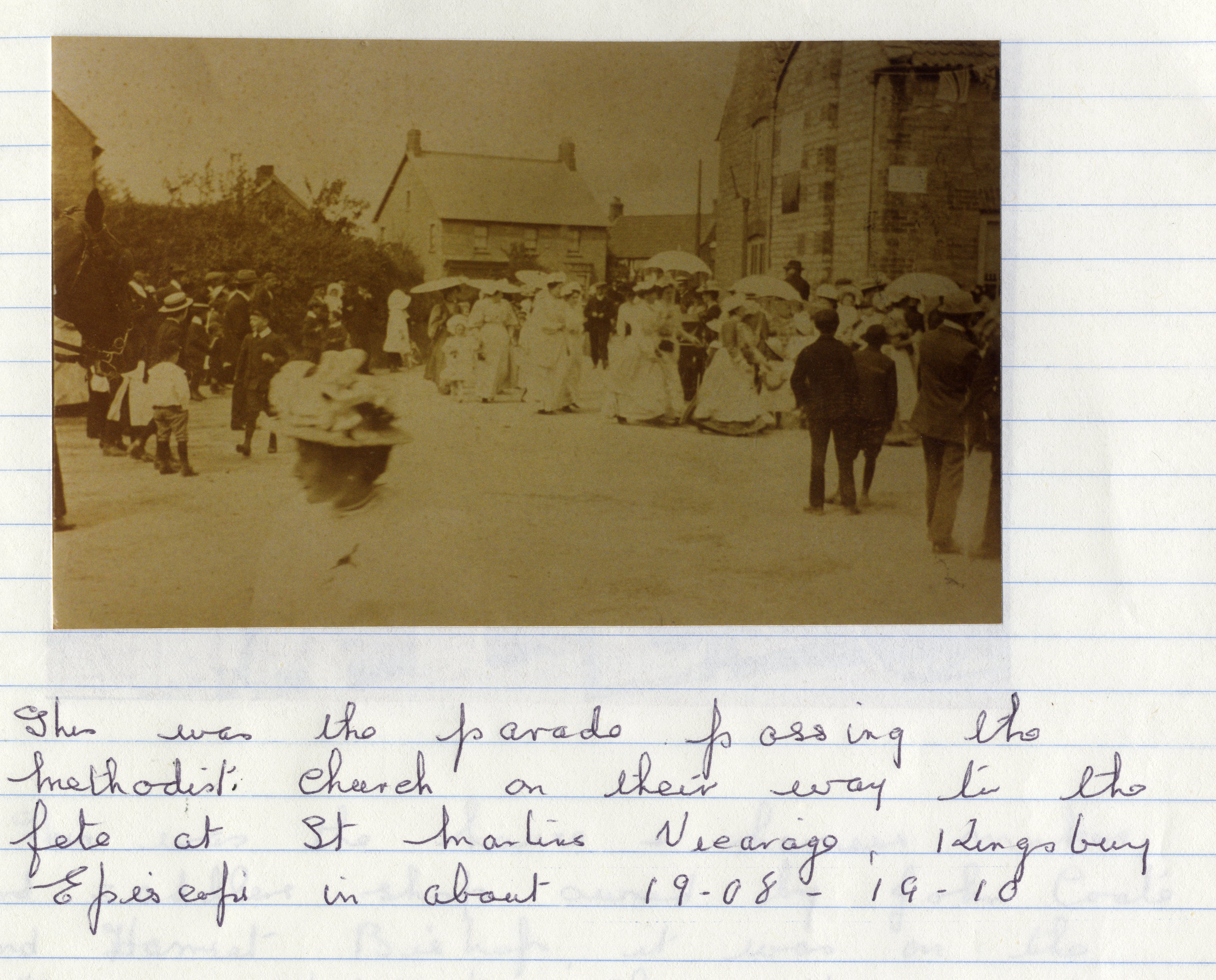Parade passing Methodist Church