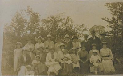 Group of women and children in Sunday best - bible class?