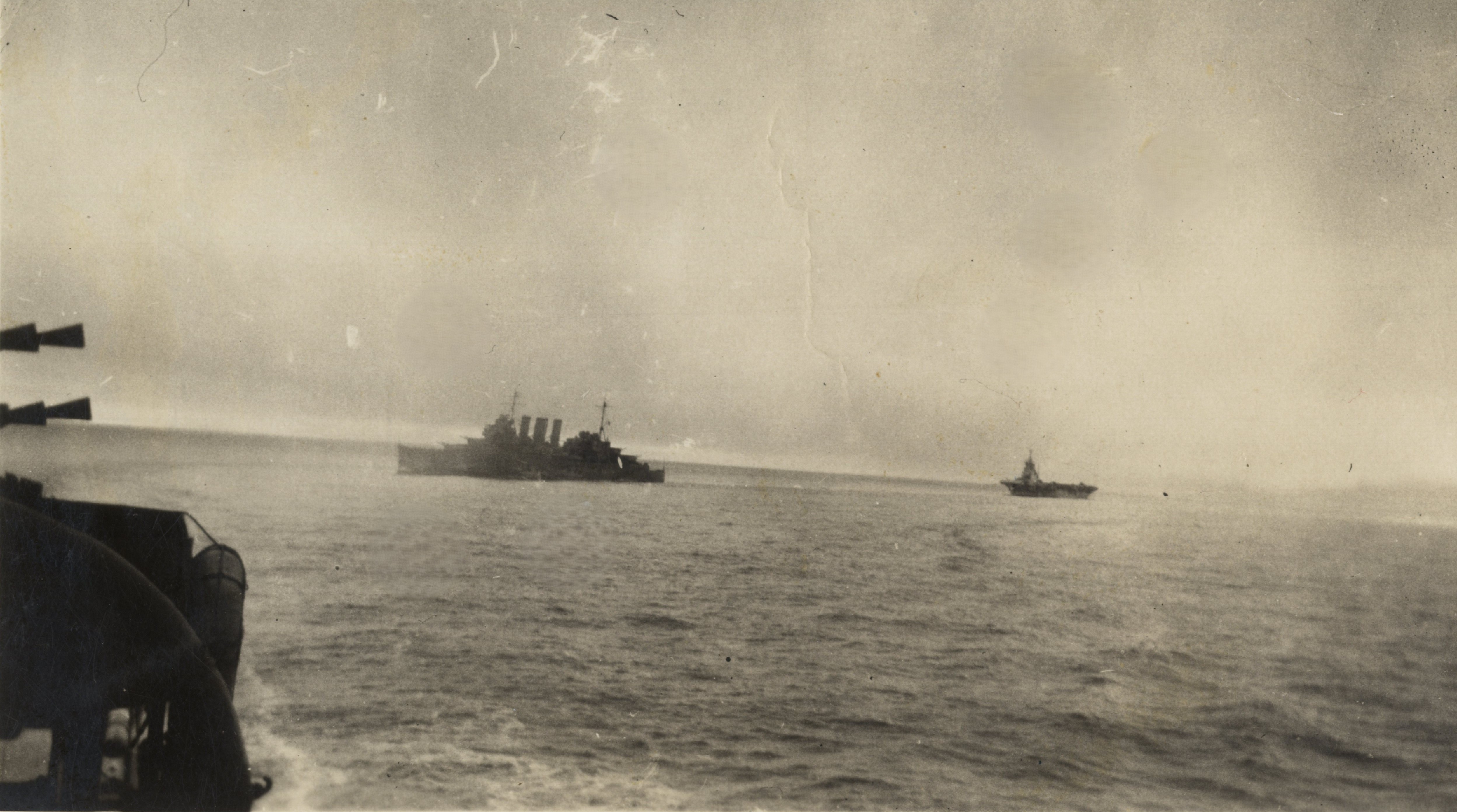 View of ships at sea from HMS Devonshire