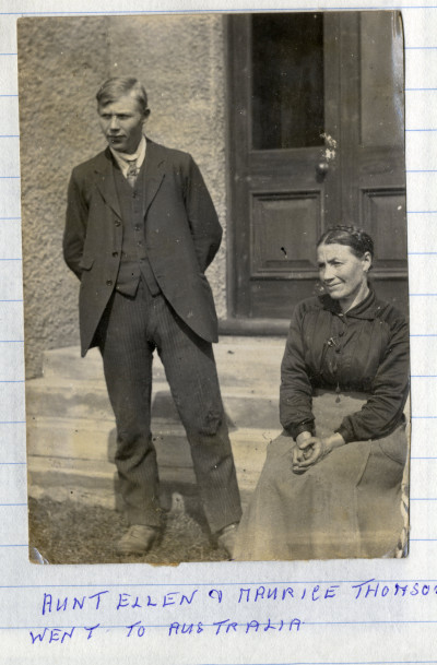 Man and woman on house steps