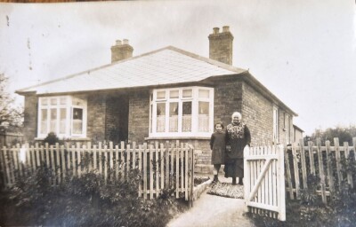 Woman and child at Stembridge bungalow
