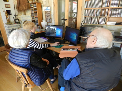 Ann and Colin Bunston sharing family photos