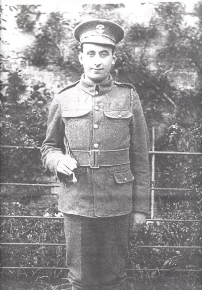 Man in WW1 uniform holding baton