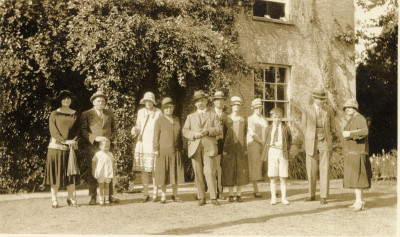 Well dressed group behind Thorney House