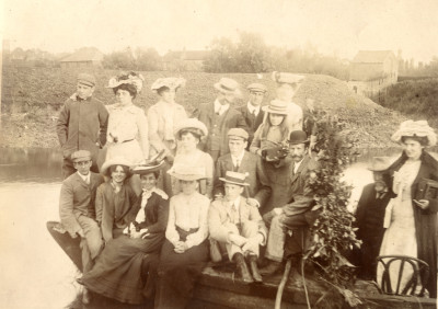 Men and women in coal barge on the River Parrett