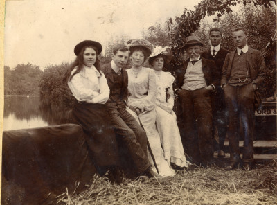 Group of men and women on coal barge on River Parrett