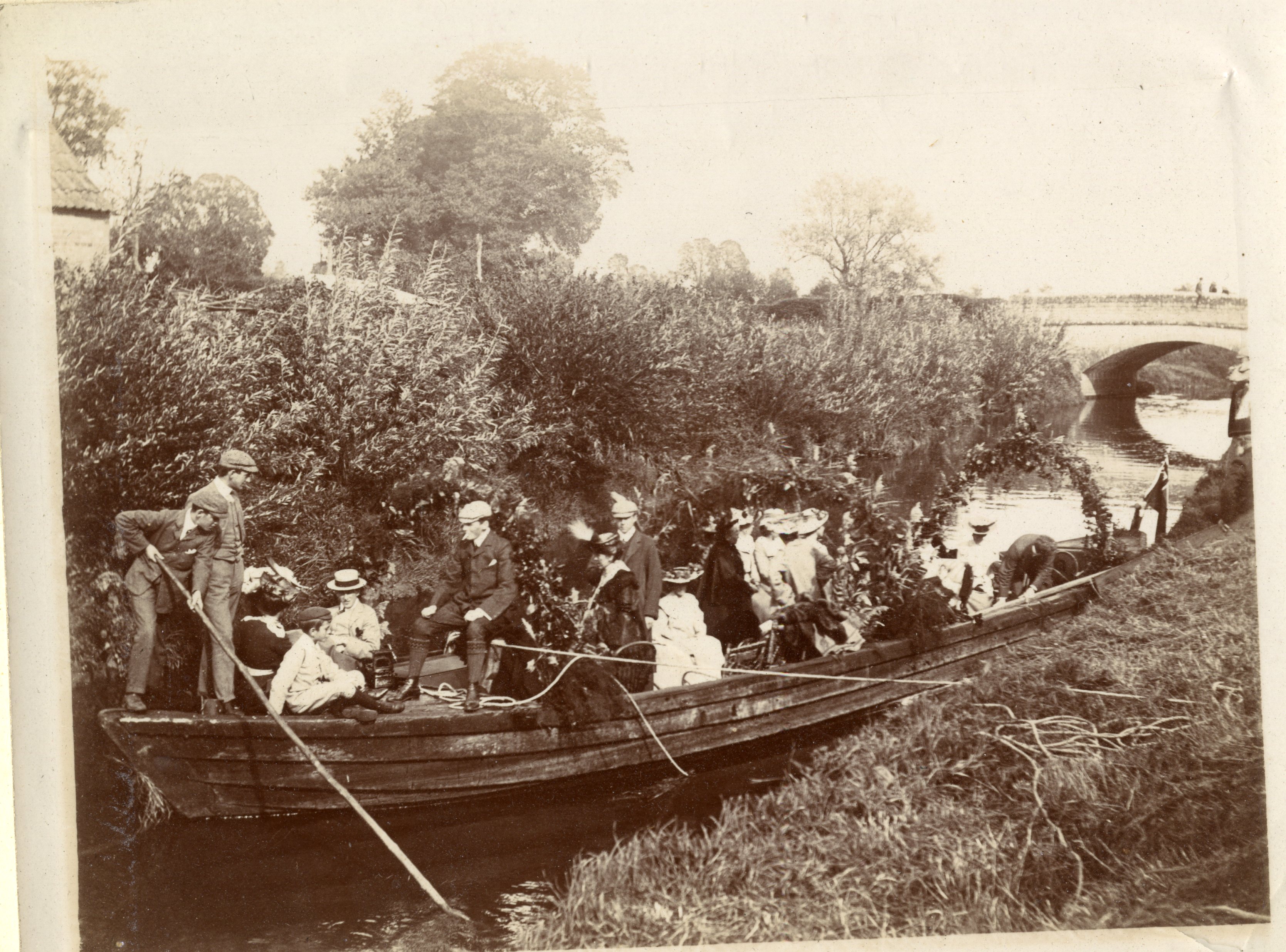 Decorated coal barge carrying group of people