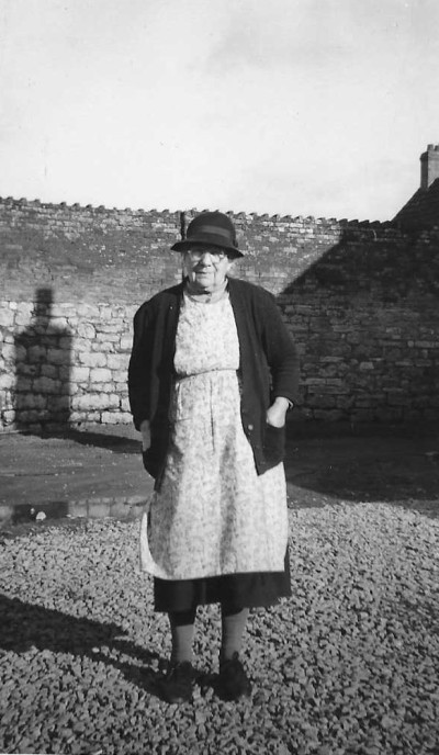Rosemary Lock in hat and apron