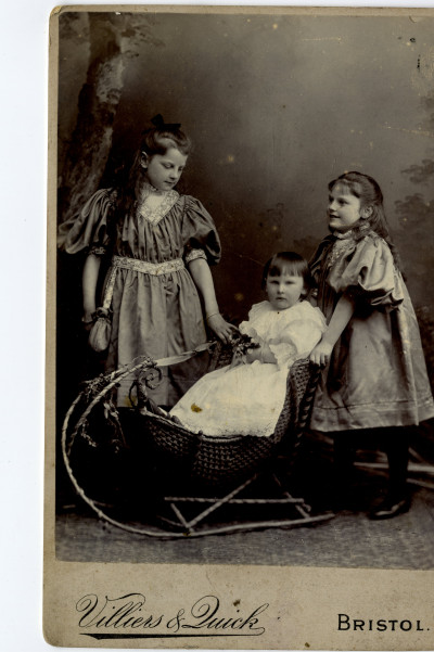 Late Victorian studio image of three children.
