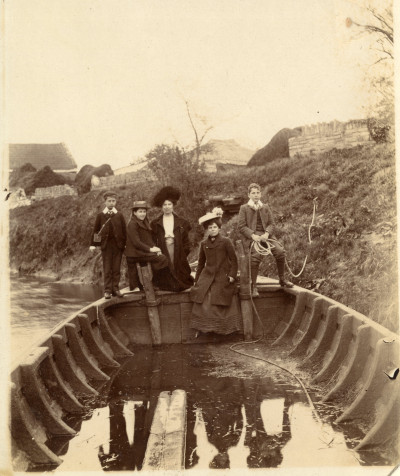 Small group in coal barge