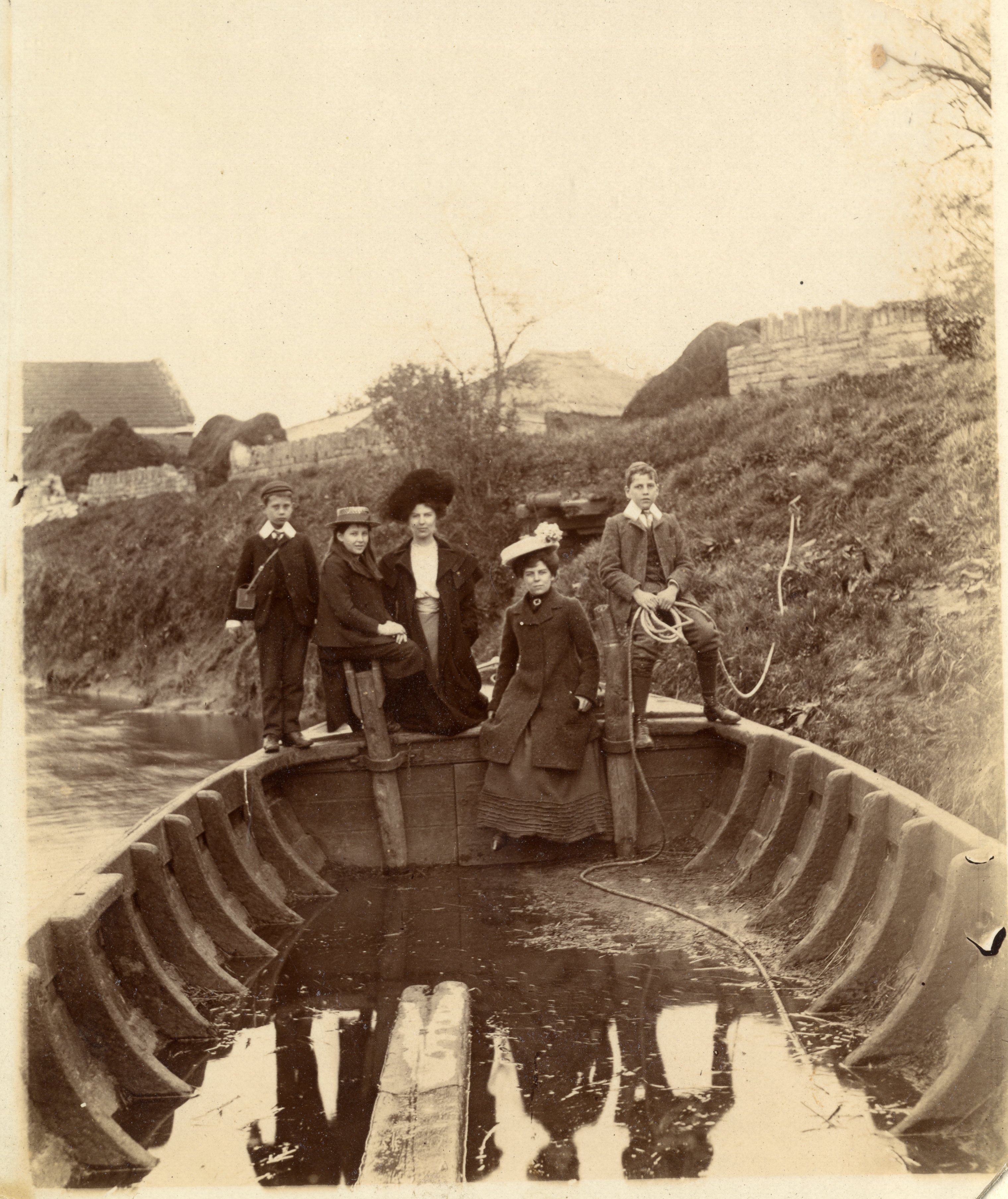 Small group in coal barge