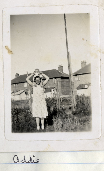 Woman with Baby on Shoulders