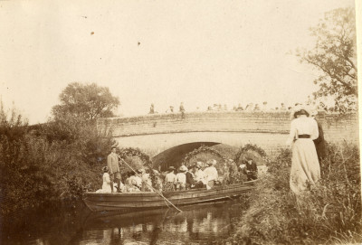 Barge Party passing beneath Thorney Bridge.