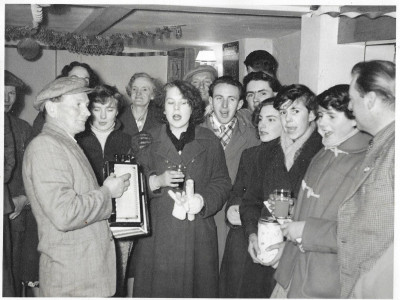 Carol singing in the Rusty Axe