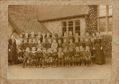 Official photo of school children and teachers