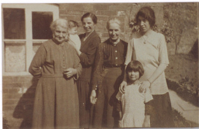 Three generations of women/children.