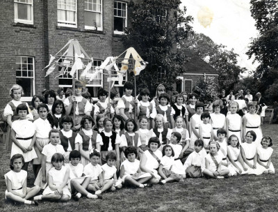 Young Girls in Festival Outfits in Vicarage Garden